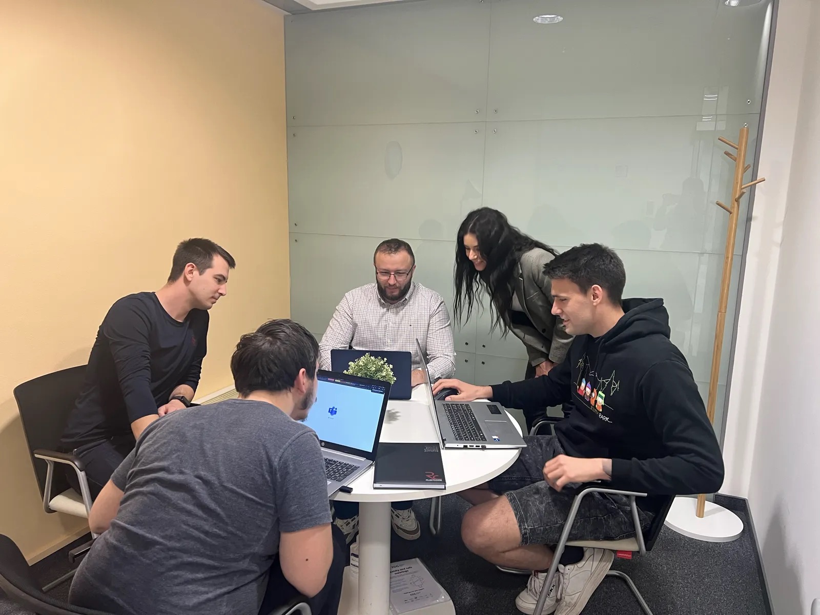 The Rubycode team talking through a project in the Zagreb meeting room
